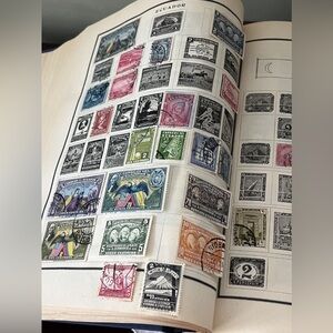 1940 Modern Postage Stamp Album with numerous vintage world stamps